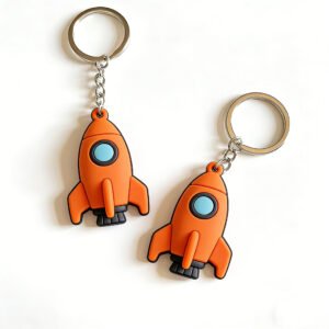Custom wholesale 3D PVC cute orange cartoon rocket keychain, space themed key pendant accessory