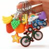 Custom wholesale 3D PVC cute cartoon fruit and vehicle keychain charms, colorful pendant key accessories