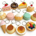 Customized PVC keychains showing 2D layered, 3D molded, and high-definition printed designs