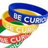 Custom wholesale colorful PVC silicone embossed text wristband, be curious motivational silicone bracelet set