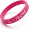 Custom wholesale pink PVC silicone strong hand graphic wristband, motivational embossed text silicone bracelet