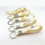 Custom silicone wristband keychains with debossed color fill logo and durable metal hardware