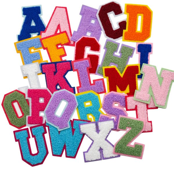 Colored letter towel with embroidered patches