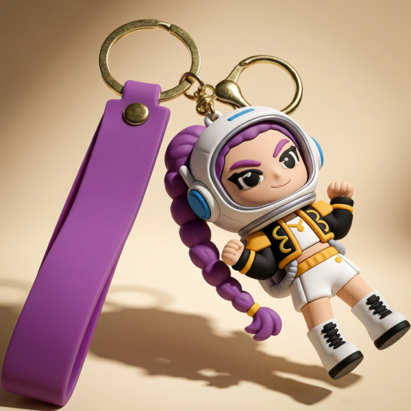 Custom 3D PVC Keychains Cute Astronaut Girl Character Custom 3D PVC rubber keychain featuring a cute female astronaut character with purple braids, colorful jacket & purple wristband on light beige background