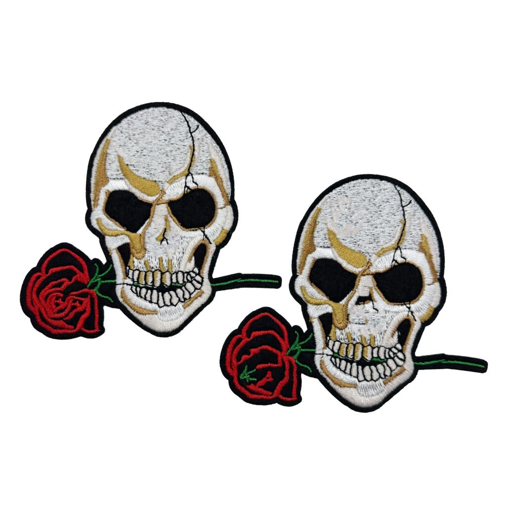 Premium embroidered skull-and-rose tactical morale patch with merrowed border and hook-and-loop backing, designed for tactical vests and backpack customization, displayed on plain white background.