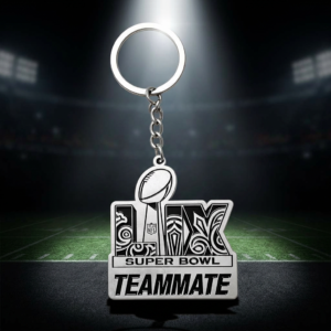 Custom silver metal keychain engraved with 'LIV Super Bowl Teammate' and NFL trophy design on dark stadium background