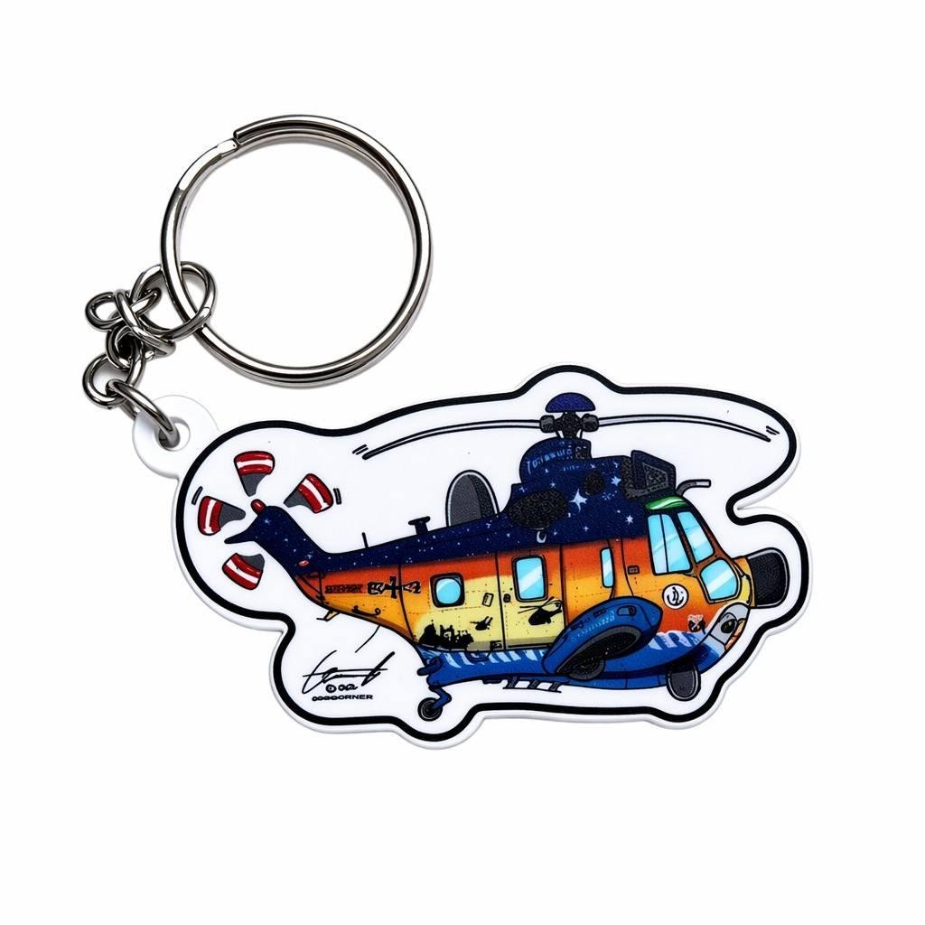 Custom printed PVC keychain featuring a colorful cartoon helicopter with 'SEARCHER EH442' text, starry sky fuselage & signature print on white background