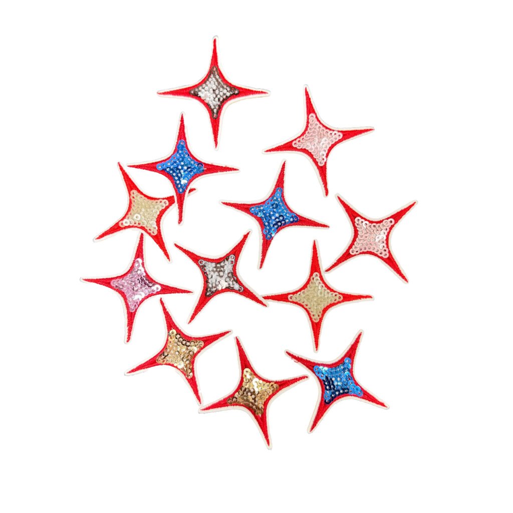 Red-trimmed four-point star-shaped sequin patch with a center composed of gold-silver and colorful sequins, displayed on a pure white background