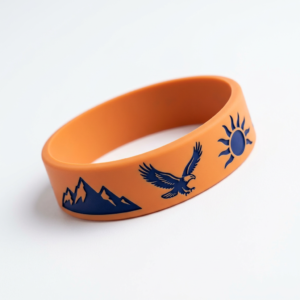 Custom Silicone Wristband Outdoor Adventure Theme Orange silicone wristband featuring deep blue mountain, eagle, and sun graphics with an outdoor sports style design, placed on a pure white background
