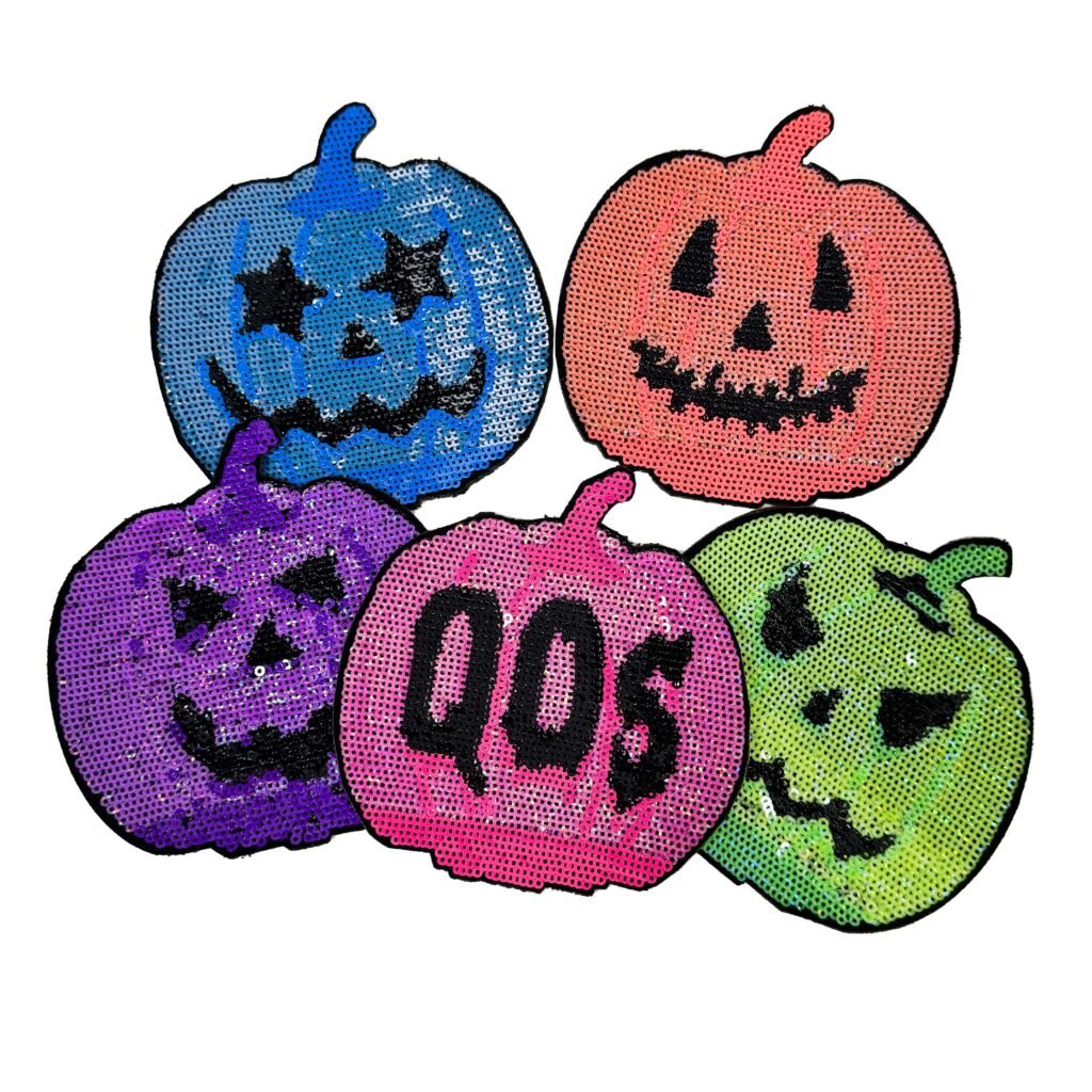 Custom Halloween pumpkin sequin patch set featuring five quirky, high-saturation jack-o'-lantern faces with iridescent reversible sequins; framed with high-density embroidery; backed with hook-and-loop tape for costumes, bags, and party gear DIY.