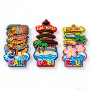 3-piece 3D Bali-themed PVC soft rubber fridge magnet set featuring a wooden directional sign, Tanah Lot Sea Temple and adventure trail marker, with vibrant colors and "Bali Vibes" text; crafted via eco-friendly PVC injection molding with strong built-in magnets, suitable for adhesion to refrigerators, whiteboards and other ferrous surfaces as travel keepsake decor.