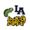 Towel embroidery patch set including a green cartoon chameleon, dark blue "LA" vintage varsity letters and yellow-black street graffiti script; crafted with thick loop pile embroidery, backed with heat-seal adhesive, ideal for DIY decoration on denim jackets, backpacks or bucket hats.