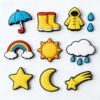 9-piece cartoon PVC soft rubber fridge magnet set featuring classic weather and day-night motifs including umbrellas, rain boots, rainbow sun, cloud raindrops, stars and moon; crafted with 3D drip molding process in vibrant colors, backed with strong magnets, suitable for decorative use on refrigerators, whiteboards and file cabinets.