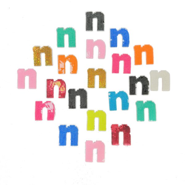 Multi-color lowercase sequin embroidery patch densely covered with gold, silver and colorful reverse sequins; flip to instantly switch colors, backed with heat-seal adhesive layer, ideal for personalized DIY decoration on kids' clothing, denim jackets, bags or hats.