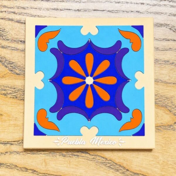 Custom PVC Soft Rubber Coaster Puebla Mexico Themed Non-Slip Heat-Resistant Mat Custom PVC soft rubber coaster featuring traditional geometric floral Talavera tile patterns from Puebla, Mexico, with bold orange, blue and purple color-blocking, printed with "Puebla Mexico" landmark text, offering non-slip and heat-resistant performance.