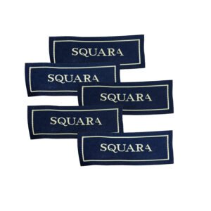 Set of "SQUARA" woven labels featuring a navy blue base with gold lettering, crafted via high-density weaving with elegant serif typography and a delicate gold fine-line border; suitable for sewn-on decoration on garment collars, cuffs or bag side seams to convey vintage elegance and premium quality.