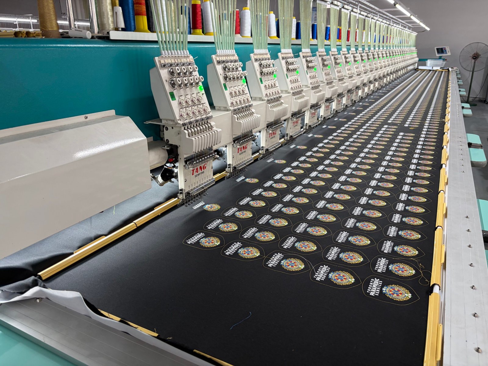Large multi-head embroidery production line
