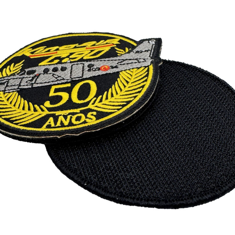 Close-up of a custom embroidered aviation patch with black hook-and-loop backing