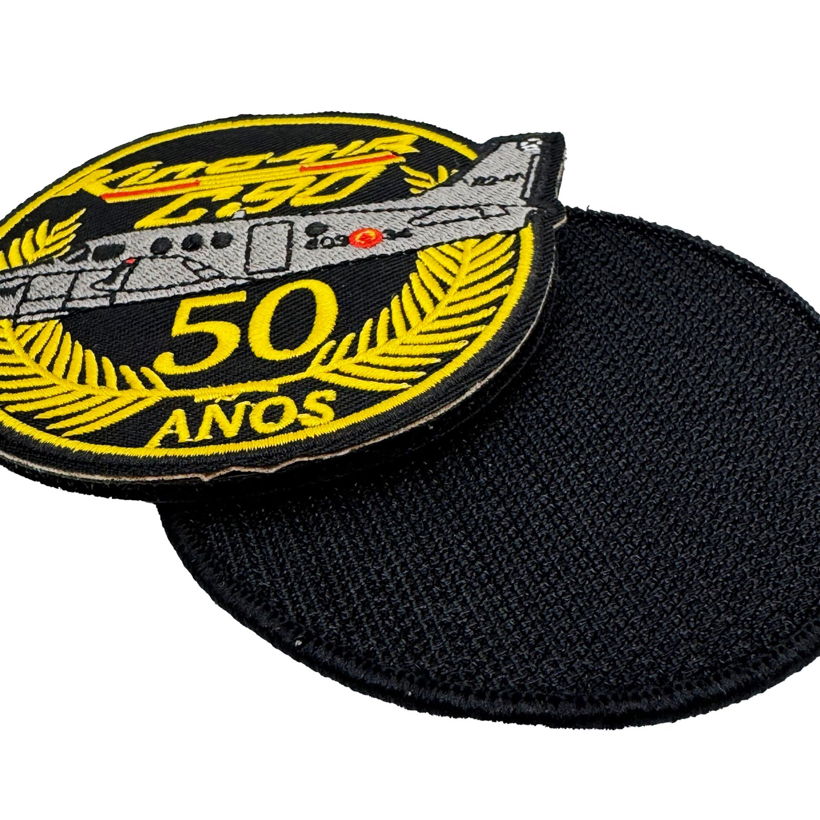 Close-up of a custom embroidered aviation patch with black hook-and-loop backing