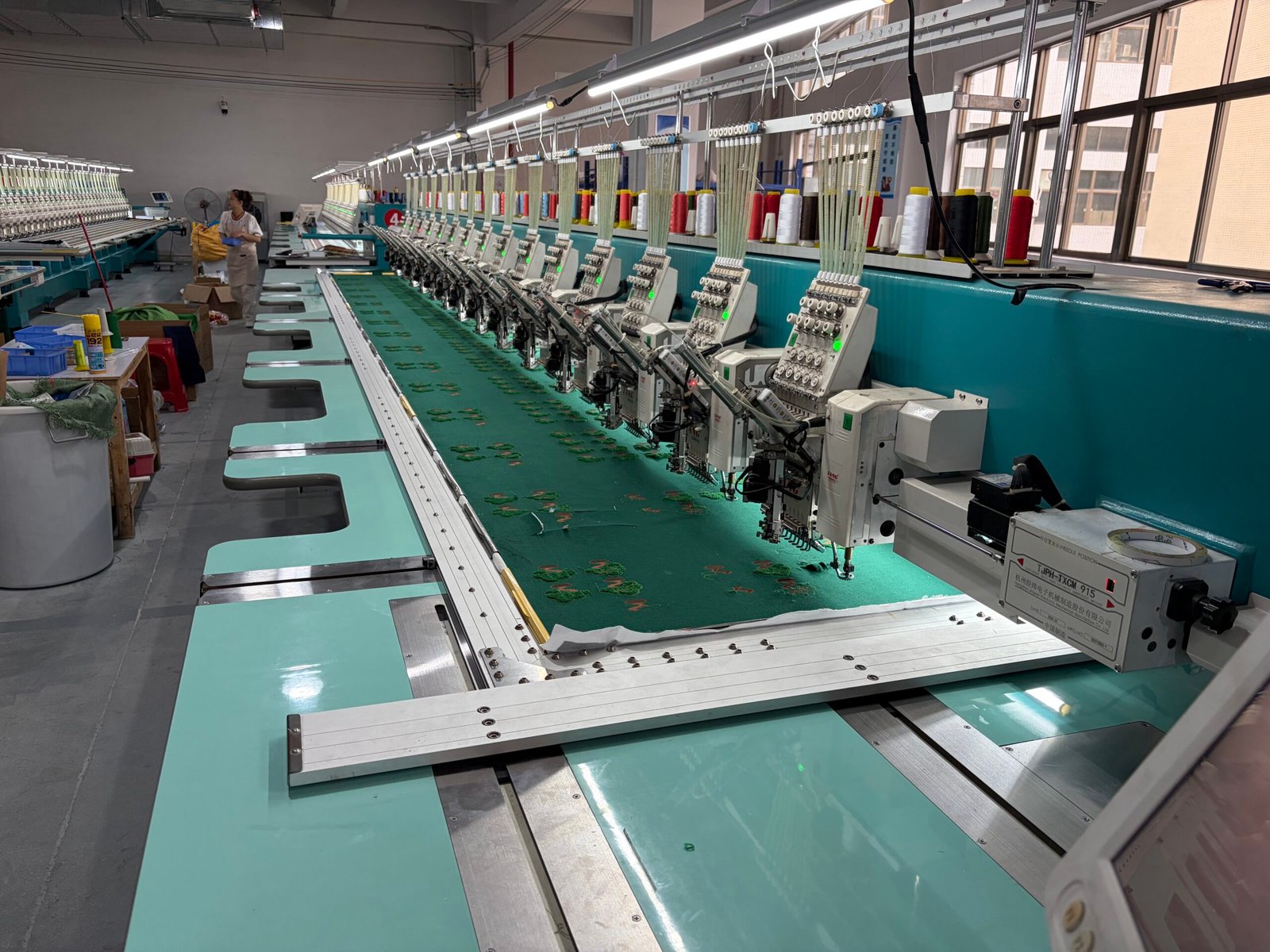 Embroidery production line producing custom textile promotional products